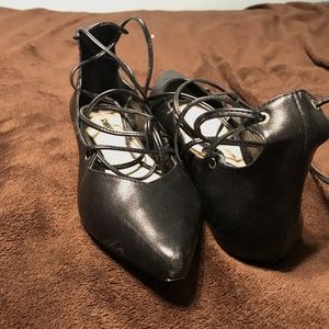 Black, pointey toe all leather, laced flats